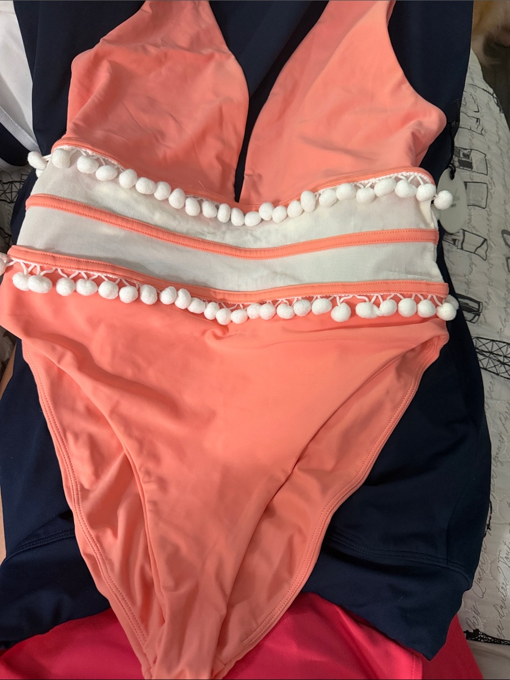NWT Tularosa Coral One-Piece Swimsuit with White Pom-Pom Trim.